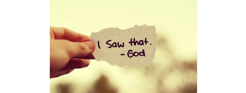 Piece of paper with 'I saw that - God' written on it.  Popcorn.dating