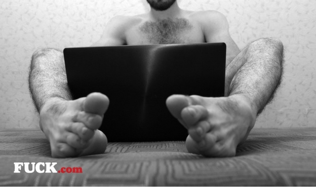 Naked man watching porn on laptop Popcorn.dating