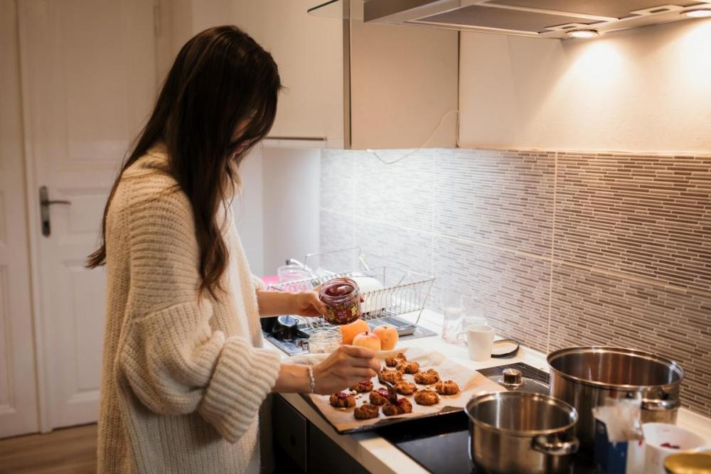 Woman cooking on a solo date