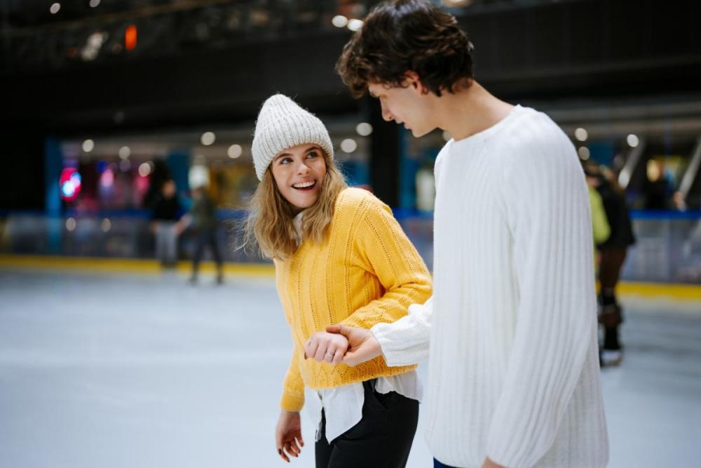 couple ice skating on their first date